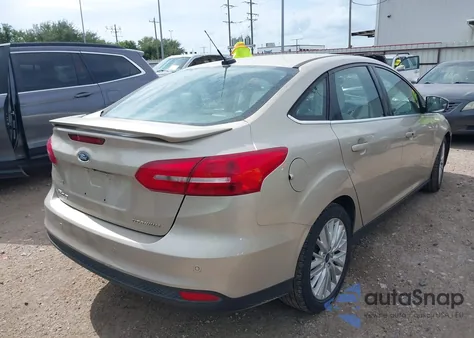 2017 Ford Focus Titanium z USA, uszkodzony, nr VIN 1FADP3J25HL267682